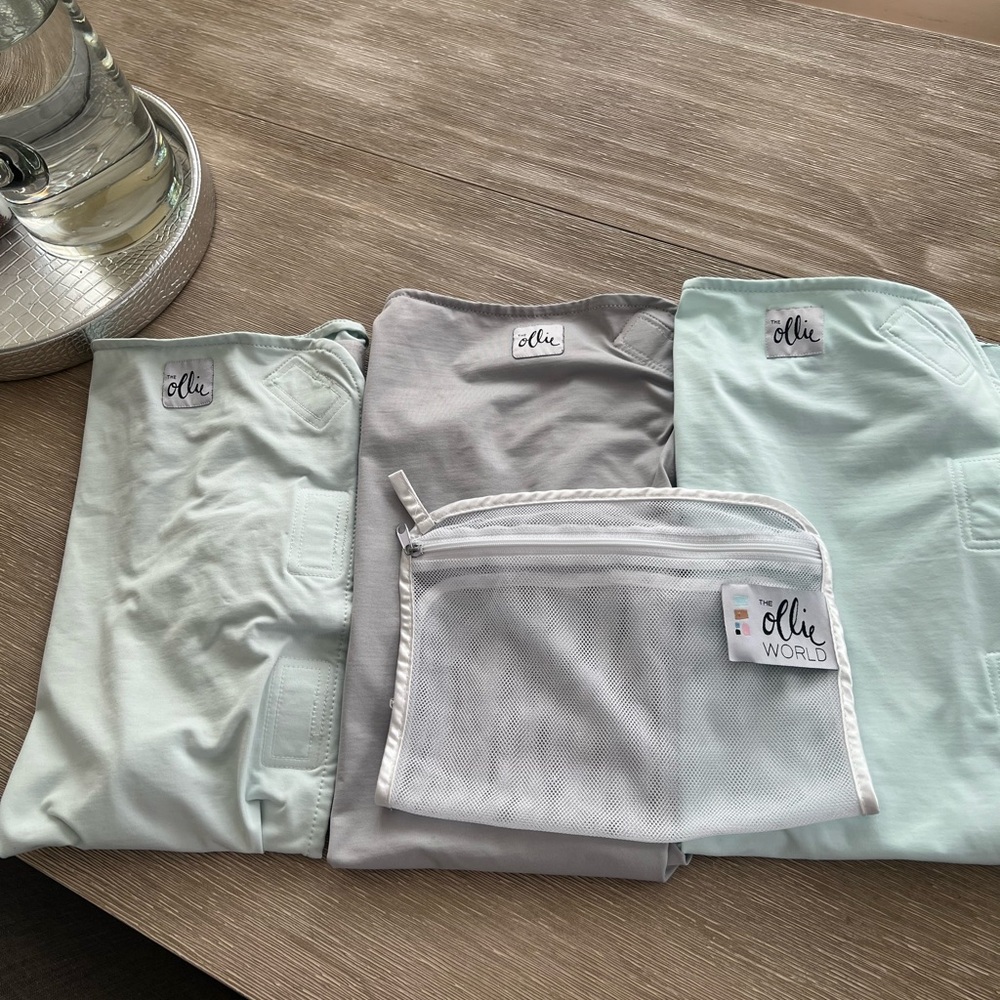 THREE Ollie baby swaddles and wash bag!